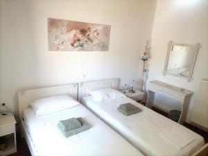 A bed or beds in a room at Villa Elvira