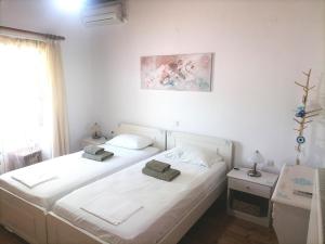 A bed or beds in a room at Villa Elvira