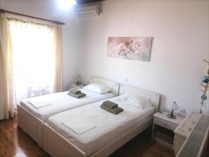 A bed or beds in a room at Villa Elvira