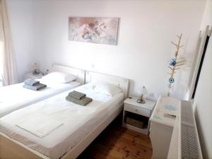 A bed or beds in a room at Villa Elvira