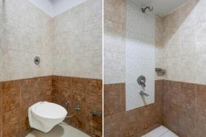 a bathroom with a toilet and a shower at Super Collection O Rai Ka Bagh Near Railway Station Formerly Pioneer Plaza in Jodhpur +35 photos