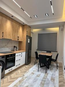 Kuchyň nebo kuchyňský kout v ubytování HomeSweet