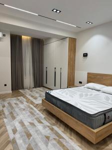 Postel nebo postele na pokoji v ubytování HomeSweet