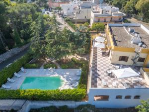 an aerial view of a house with a swimming pool at Villa il panorama sullo Ionio in Tuglie