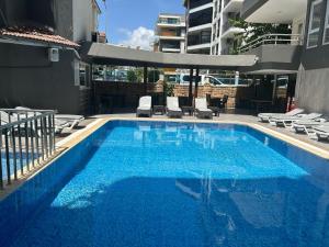 The swimming pool at or close to Rosella Hotel