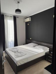 Postel nebo postele na pokoji v ubytování HOTEL Krokodili