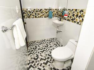 Salle de bains dans l'établissement Hostel Casa de las Palmas Tours
