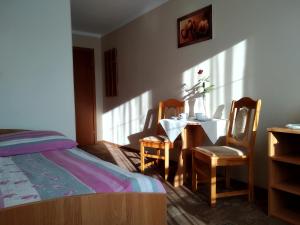 Postel nebo postele na pokoji v ubytování Willa Lenka