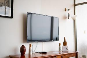 TV a/nebo společenská místnost v ubytování Paradise Views