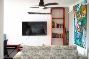 TV a/nebo společenská místnost v ubytování Paradise Views