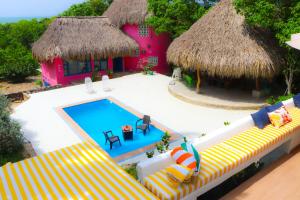 an aerial view of a villa with a swimming pool at Serenity by the Sea in Juan de Acosta
