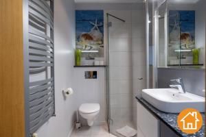 Kúpeľňa v ubytovaní Apartamenty Horyzont - visitopl
