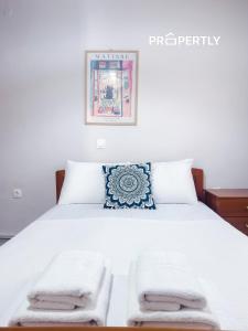 Ένα ή περισσότερα κρεβάτια σε δωμάτιο στο SeaSide Family House - Private Parking #PROPERTLY