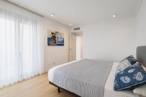 Ένα ή περισσότερα κρεβάτια σε δωμάτιο στο Valencia Beachfront Home 21 +27 φωτογραφίες