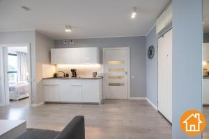 Kuchyňa alebo kuchynka v ubytovaní Apartamenty Horyzont - visitopl