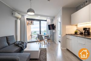 Kuchyňa alebo kuchynka v ubytovaní Apartamenty Horyzont - visitopl