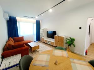 a living room with a couch and a table at VeRa Suite 2 in Silistra