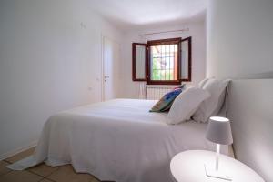 Ένα ή περισσότερα κρεβάτια σε δωμάτιο στο Casa Ca D'oro