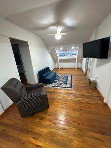 TV a/nebo společenská místnost v ubytování Villa Cavaliere