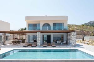 Πισίνα στο ή κοντά στο Athoros Luxury Villas