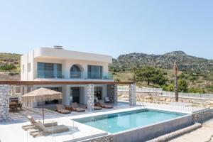 Πισίνα στο ή κοντά στο Athoros Luxury Villas