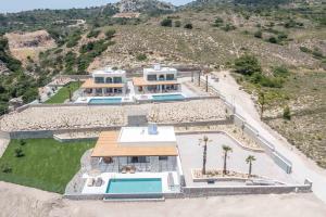 Πισίνα στο ή κοντά στο Athoros Luxury Villas