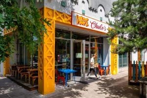 a man walking in front of a restaurant at Stay Portland - Alberta Arts District Studio Suite in Portland +26 photos