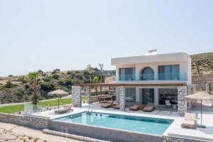 Πισίνα στο ή κοντά στο Athoros Luxury Villas
