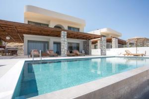 Πισίνα στο ή κοντά στο Athoros Luxury Villas