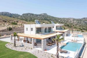 Πισίνα στο ή κοντά στο Athoros Luxury Villas