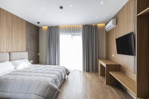 Postel nebo postele na pokoji v ubytování Siel Hotel