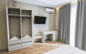 TV a/nebo společenská místnost v ubytování Siel Hotel