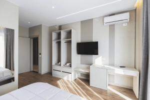 TV a/nebo společenská místnost v ubytování Siel Hotel