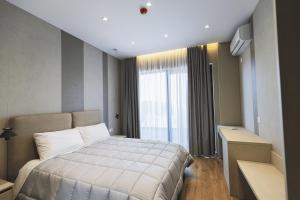 Postel nebo postele na pokoji v ubytování Siel Hotel