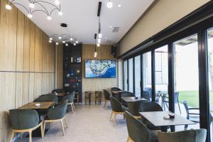 TV a/nebo společenská místnost v ubytování Siel Hotel