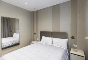 Postel nebo postele na pokoji v ubytování Siel Hotel