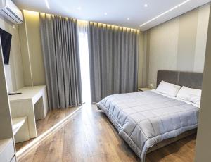 Postel nebo postele na pokoji v ubytování Siel Hotel