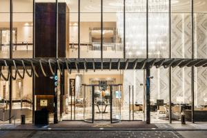 a view of a building with a revolving door at The St. Regis Chengdu in Chengdu