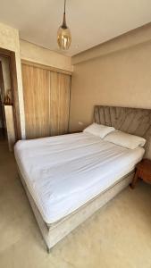 Ένα ή περισσότερα κρεβάτια σε δωμάτιο στο Maison vacances Mansoria