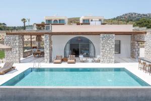 Πισίνα στο ή κοντά στο Athoros Luxury Villas