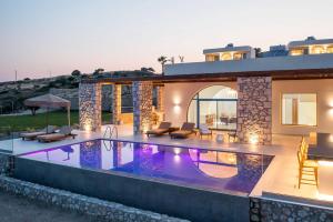Πισίνα στο ή κοντά στο Athoros Luxury Villas