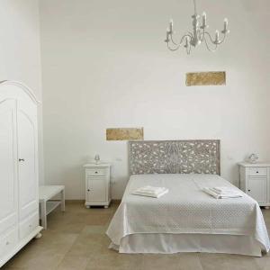 Postel nebo postele na pokoji v ubytování B&B Sideris in Salento
