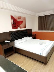 Cama ou camas em um quarto em Hotel Metropolis Centro São Paulo