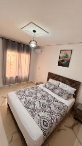 Postel nebo postele na pokoji v ubytování Villa avec Piscine Privée.