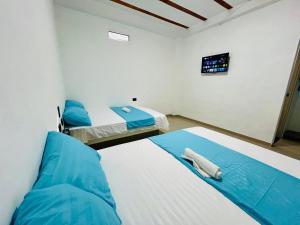 Postel nebo postele na pokoji v ubytování Amanecer Santorini
