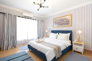 Postel nebo postele na pokoji v ubytování Big Family Home