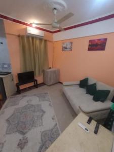 Posezení v ubytování ALHASANI APARTMENT