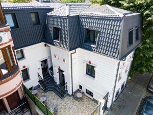 an aerial view of a house with a roof at Nobilis Boutique Foisor in Bucharest