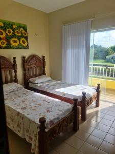 Postel nebo postele na pokoji v ubytování Lindo Apartamento Duplex todo mobiliado com piscina privativa 4 quartos