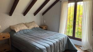 Postel nebo postele na pokoji v ubytování Naty